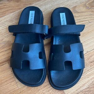 Steve Madden black sandals.